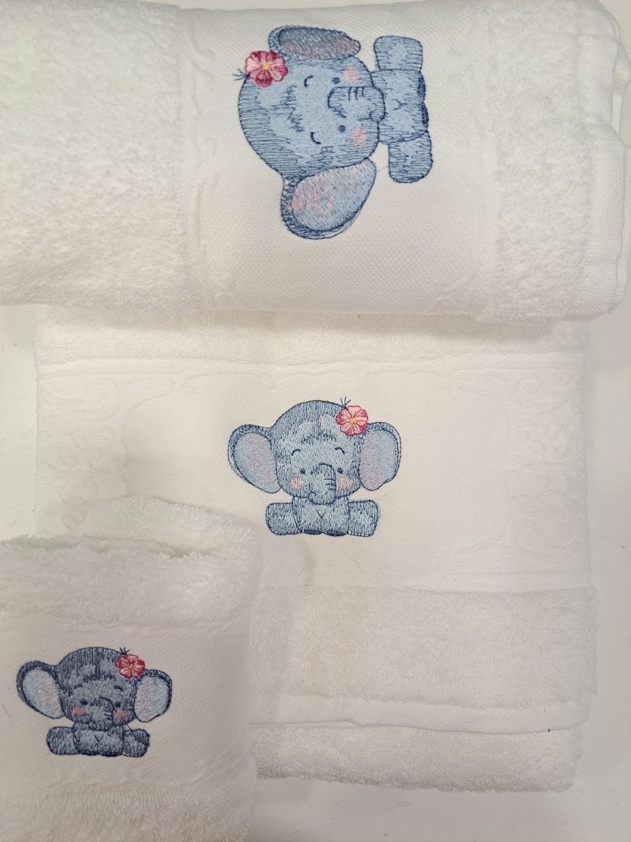 toalla blanca elefante bordado
